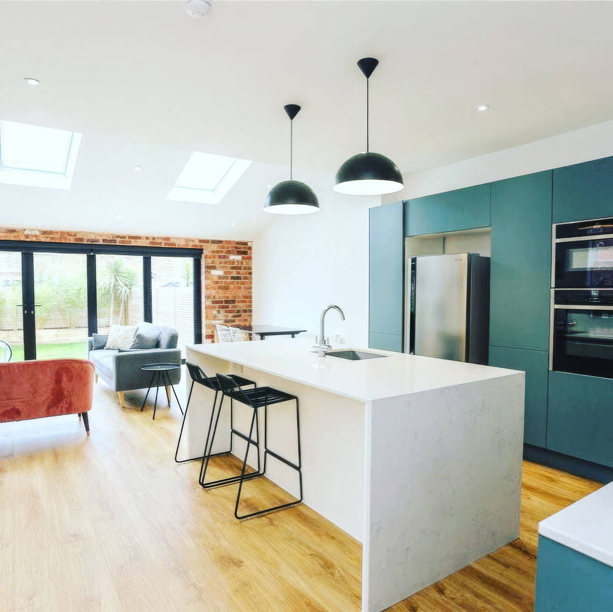 A newly completed double storey side and rear house extension in Manchester by a professional construction company.